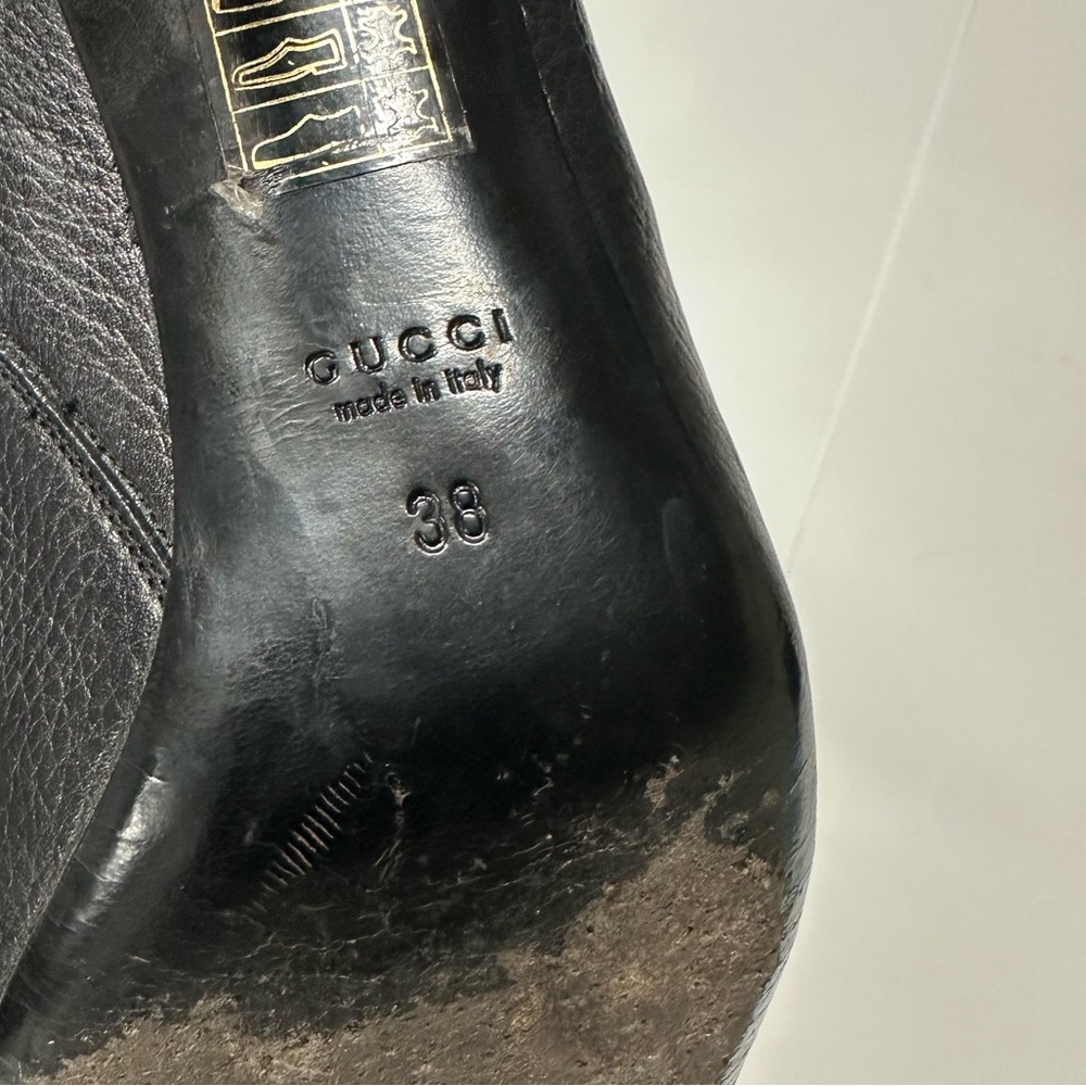 Gucci Women’s Black Leather Knee-High Heeled Boots with gold GG buckle strap - Picture 7 of 12